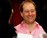 Patrick French who read from The World is What it is  surrounded by admirers